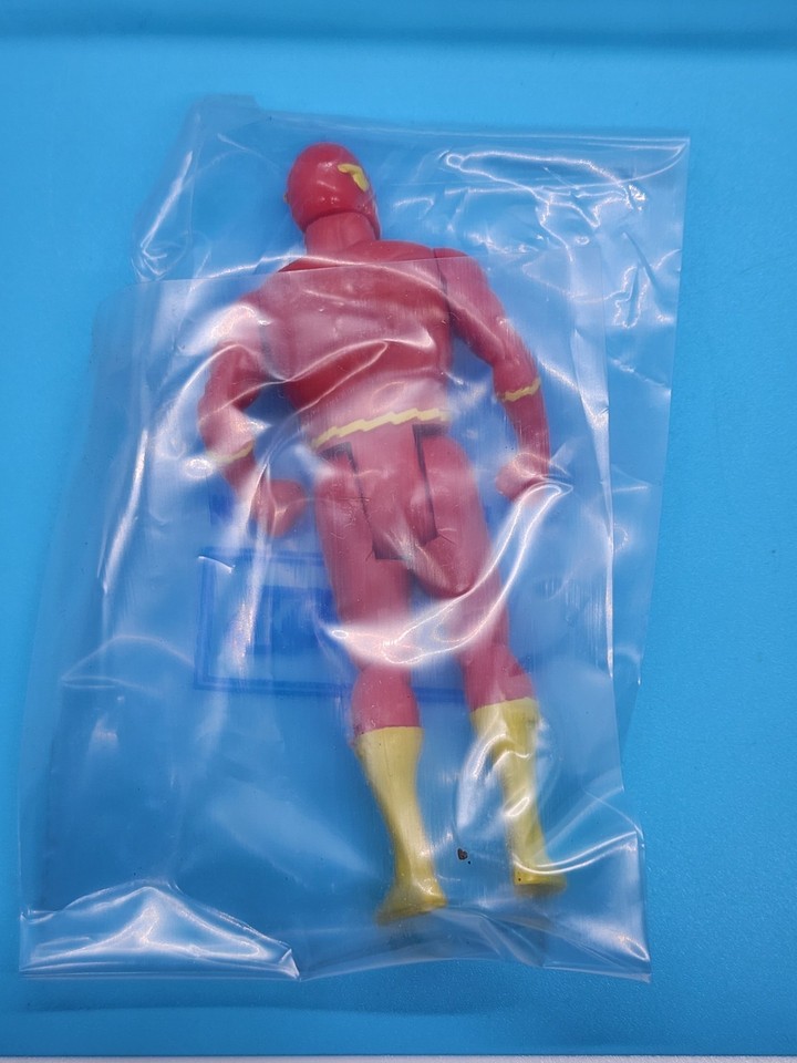 The Flash (polybag) carded - Back. Flash figures in their original Kenner baggies. The baggies were never sealed, but folded over at the bottom.